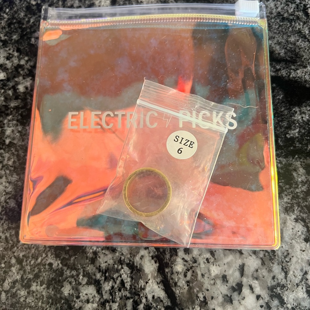 Electric Picks Gold Ring